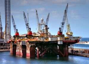 Oil prices edged lower after Middle East oil exports resumed